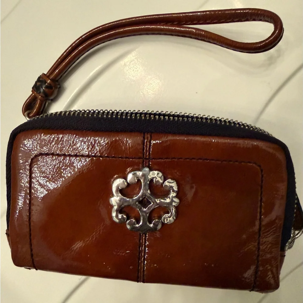 Brighton Shiny patent leather Brown Wristlet with Silver Emblem